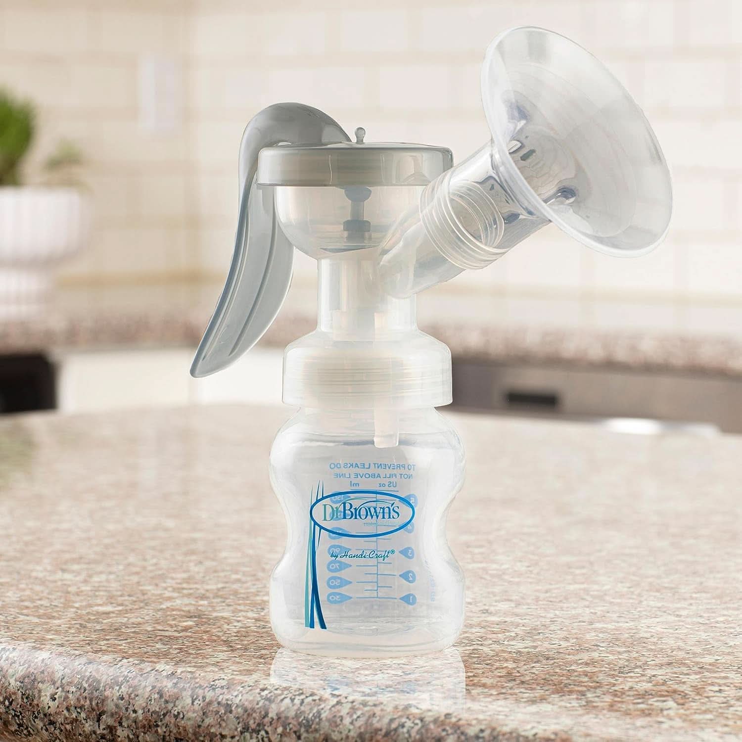 Tire-lait manuel avec protection Softshape 100% silicone (B, bride 25 mm) et options anti-coliques + biberon 150 ml à col large avec tétine à débit lent niveau 1 Accessoires Alimentation et Allaitement Bebe Naty Shop