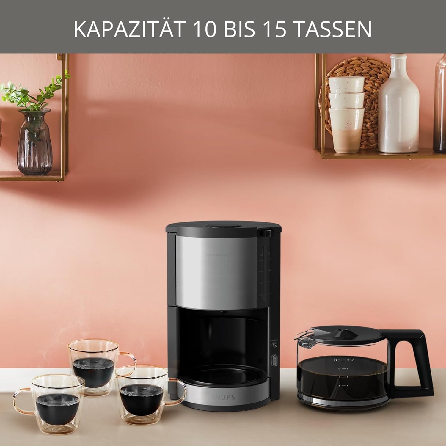 Krups KM3210 Pro Aroma Plus Machine à expresso, 10 tasses, 1,25 L, maintien au chaud pendant 30 minutes, fenêtre de niveau d'eau visible, système anti-goutte, noir avec applications en acier inoxydable