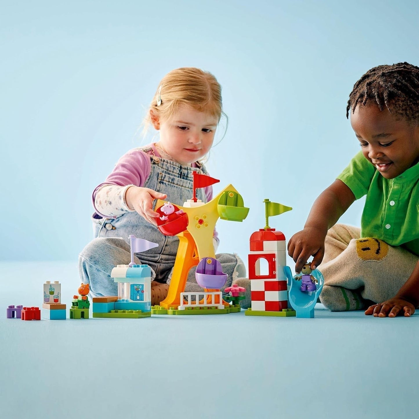 LEGO DUPLO Peppa Wutz Fairground - Jouets pour enfants et jouets de motricité à partir de 2 ans - Jeux préscolaires avec grande roue, toboggan et 3 figurines dont Mollie Kitty et Klausi Kläff - Cadeau pour les enfants 10453 Jeux de construction Besuche den LEGO-Store