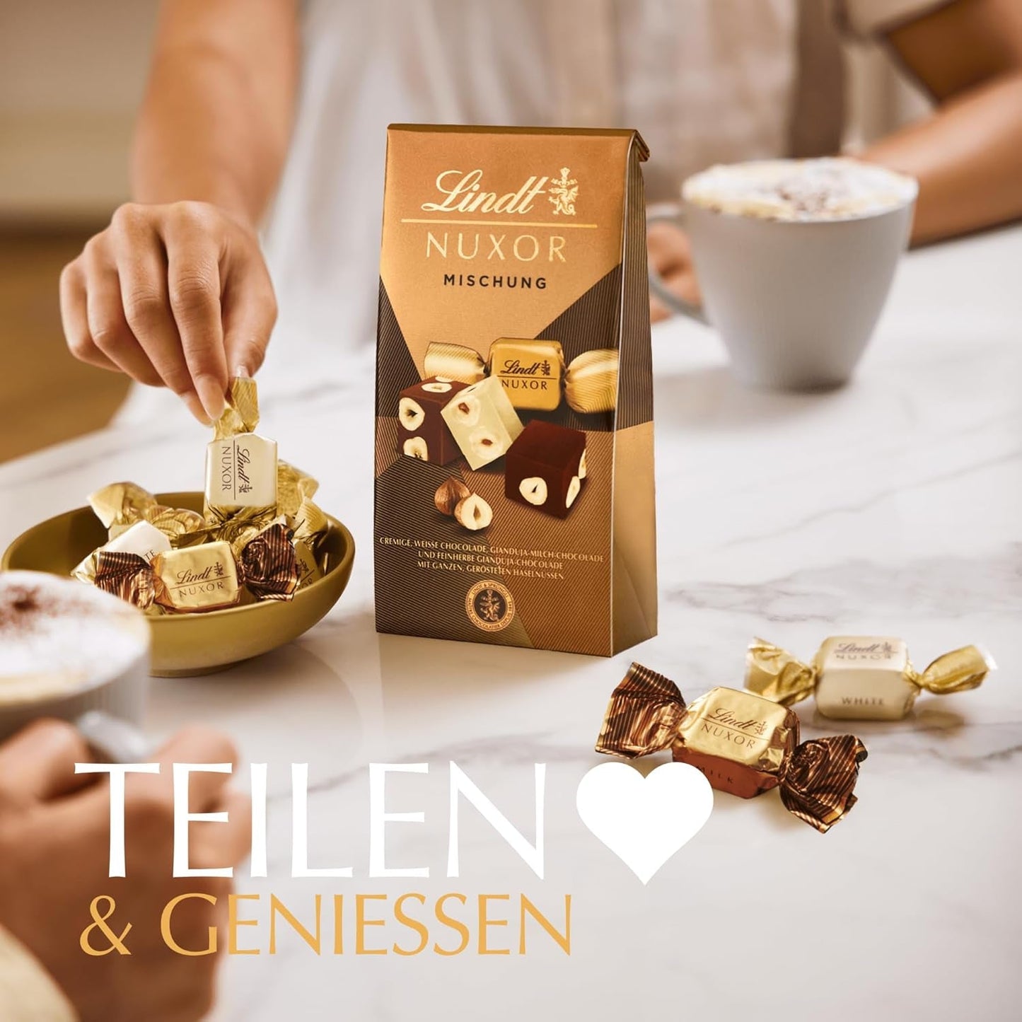 Chocolat Lindt | Mélange pour sac NUXOR | 103g | Cubes de chocolat crémeux au Gianduja en trois assortiments avec noisettes entières grillées | Cadeau chocolat