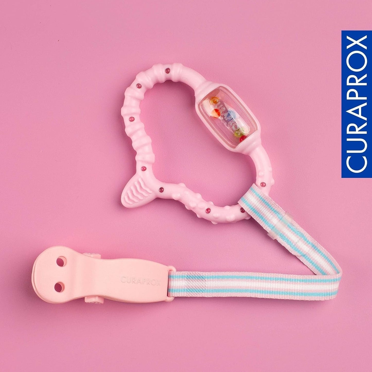 Anneau de dentition Curaprox pour bébés - Pour tout-petits 0-24 mois/Soulage la douleur dentaire et favorise les compétences motrices | Sans BPA, Rose, avec brosse à dents d'entraînement/Fabriqué en Suisse